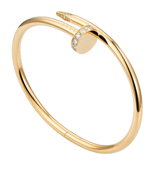 LYXIGT NAGELARMBAND - GULD